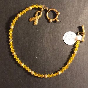 Handcrafted gold awareness bracelet